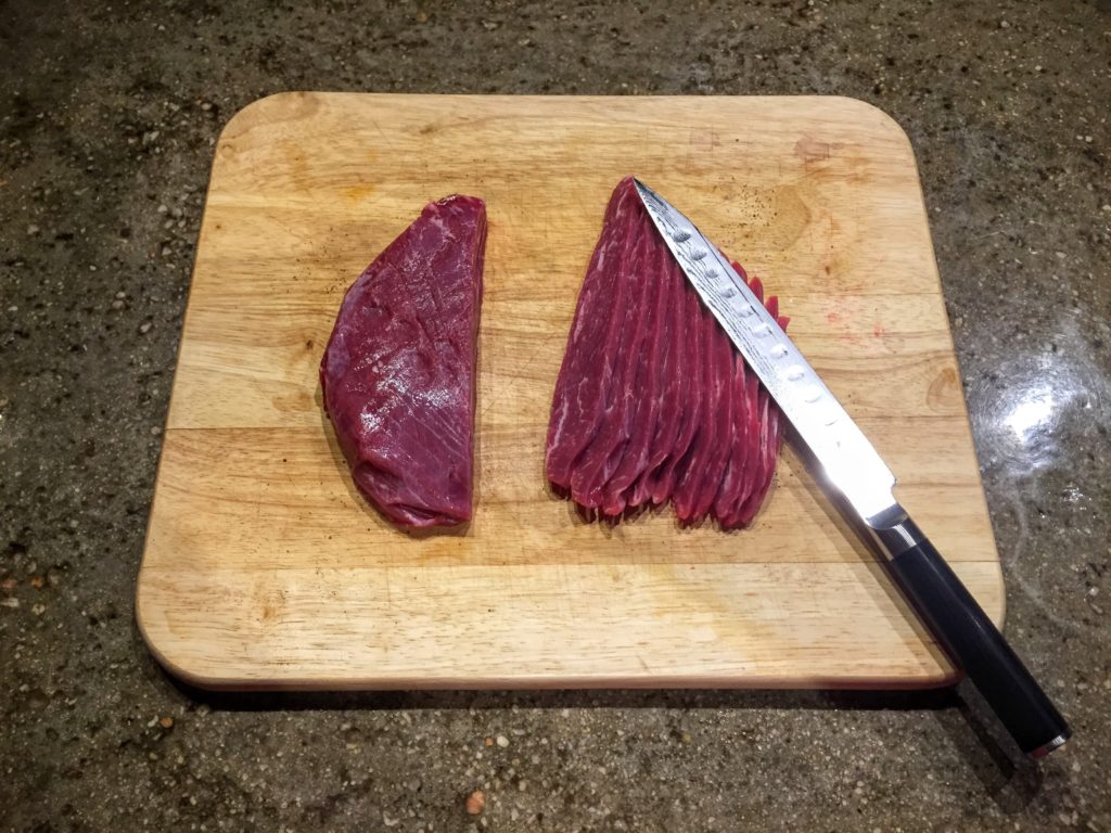 Slice the beef with the grain